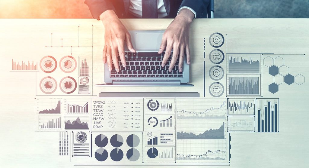 A desk with different data and graphics 